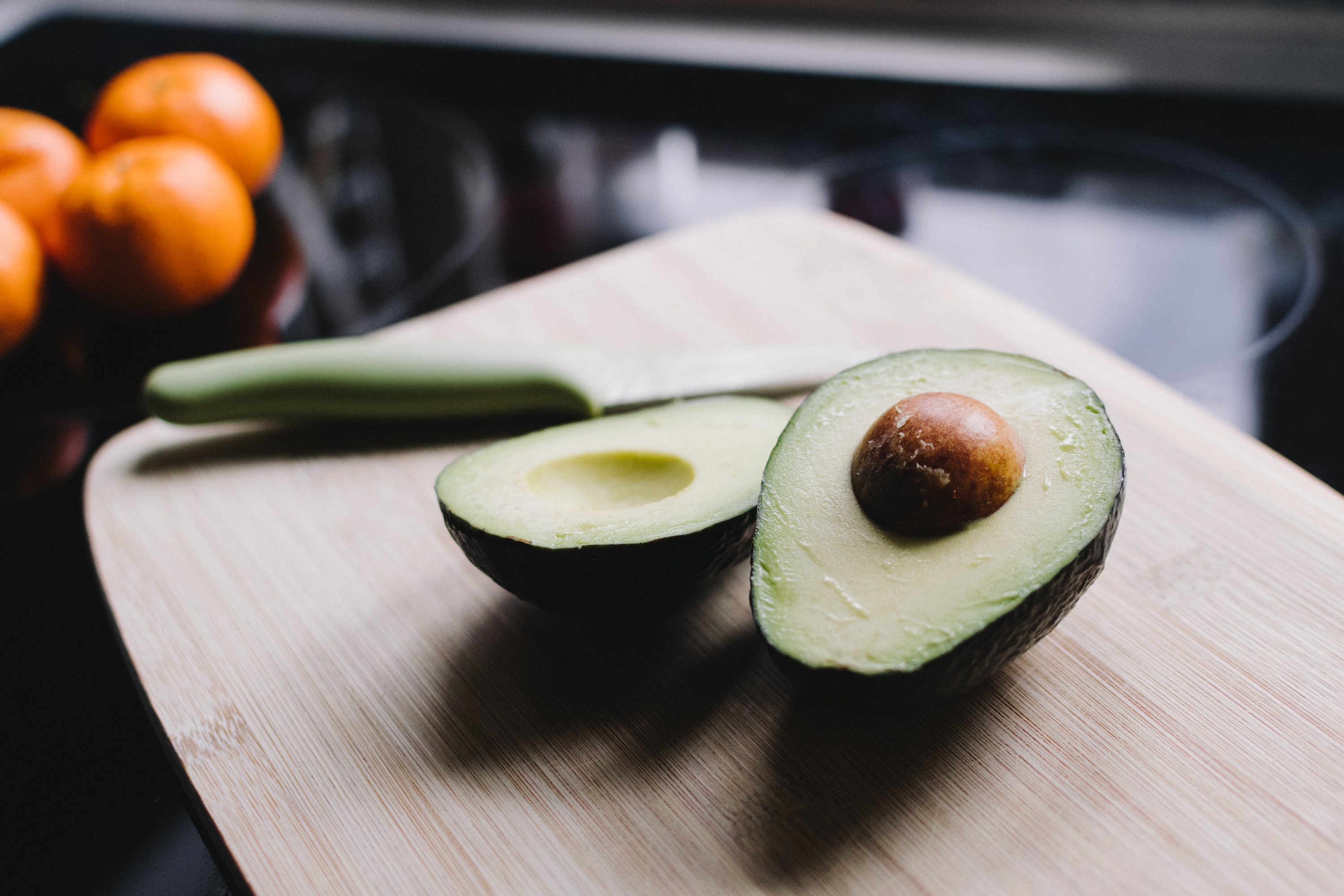 close up photo of a cut-open avocado