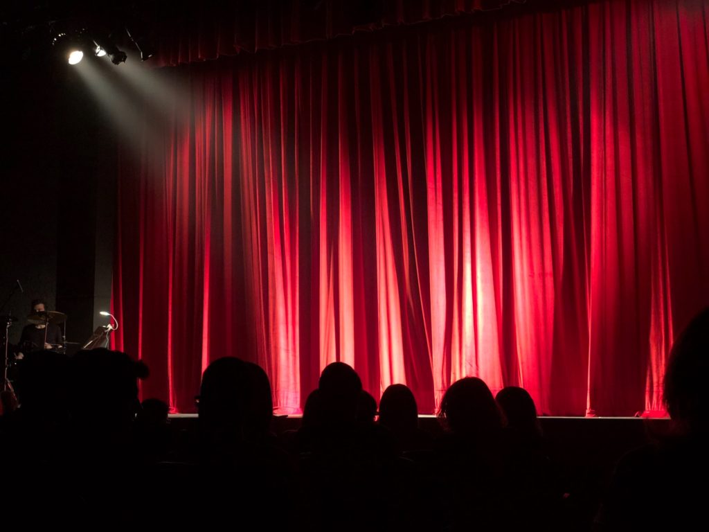 empty stage; audience waiting for show to begin. Improv comedy as a hobby for extroverts 