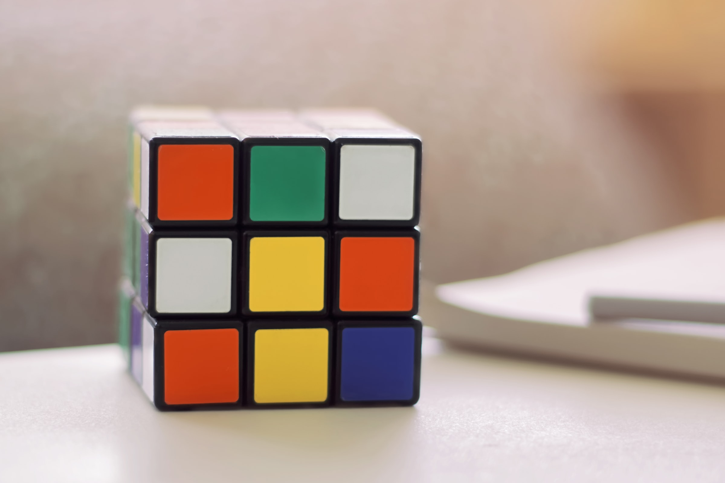 close up view of rubik's cube, handheld games as a hobby to cope with stress