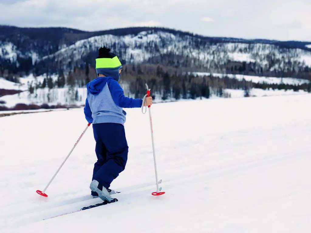 cross country skiing child winter hobby