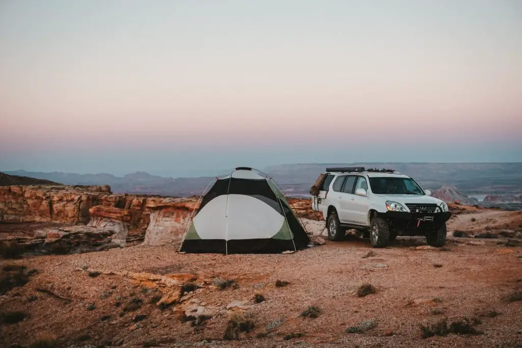list of hobbies includes camping and outdoor activities.  Car camping and text near expansive view of desert