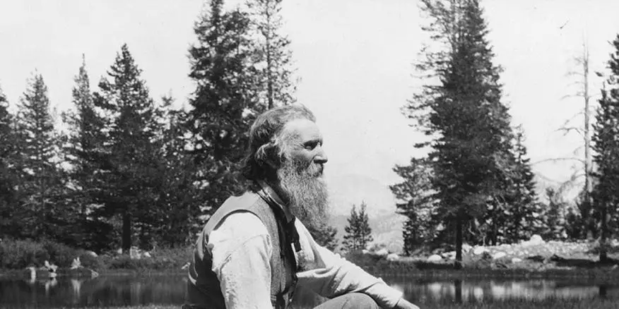 john muir in black and white appreciating nature and camping.  Camping quotes in appreciation of wilderness