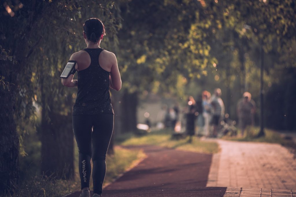 woman running on path