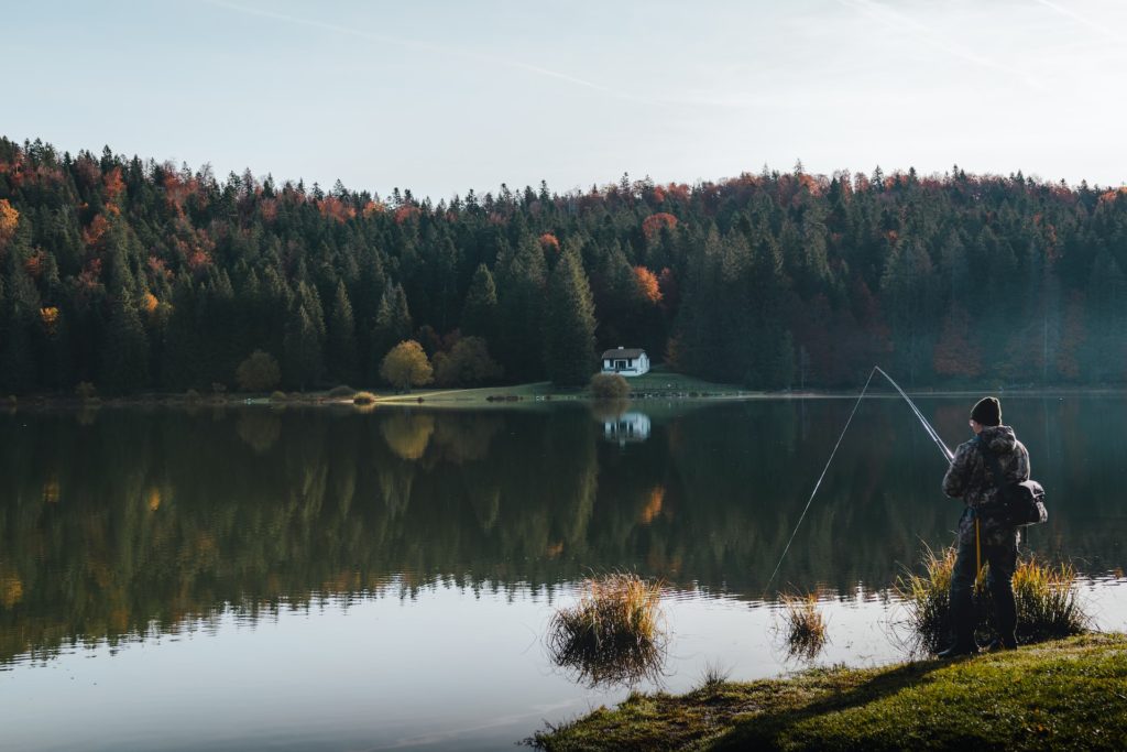 man fishing on the river, retirement hobby