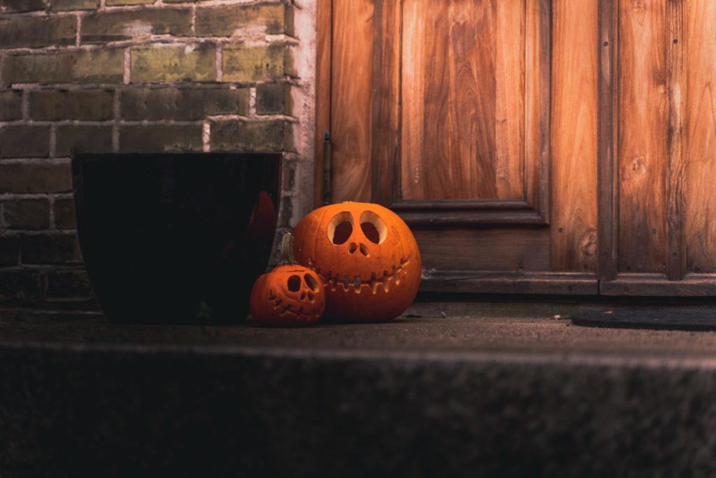 october activity carving pumpkins, pumpkins on a front porch