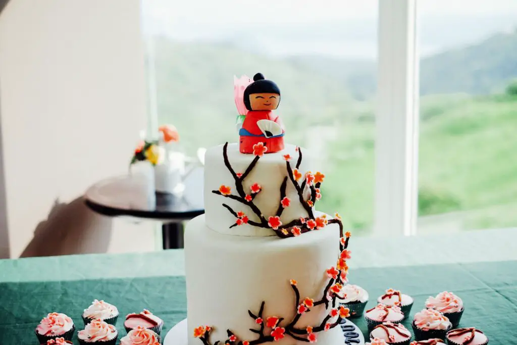 view of a decorative cake with natural light coming from a window