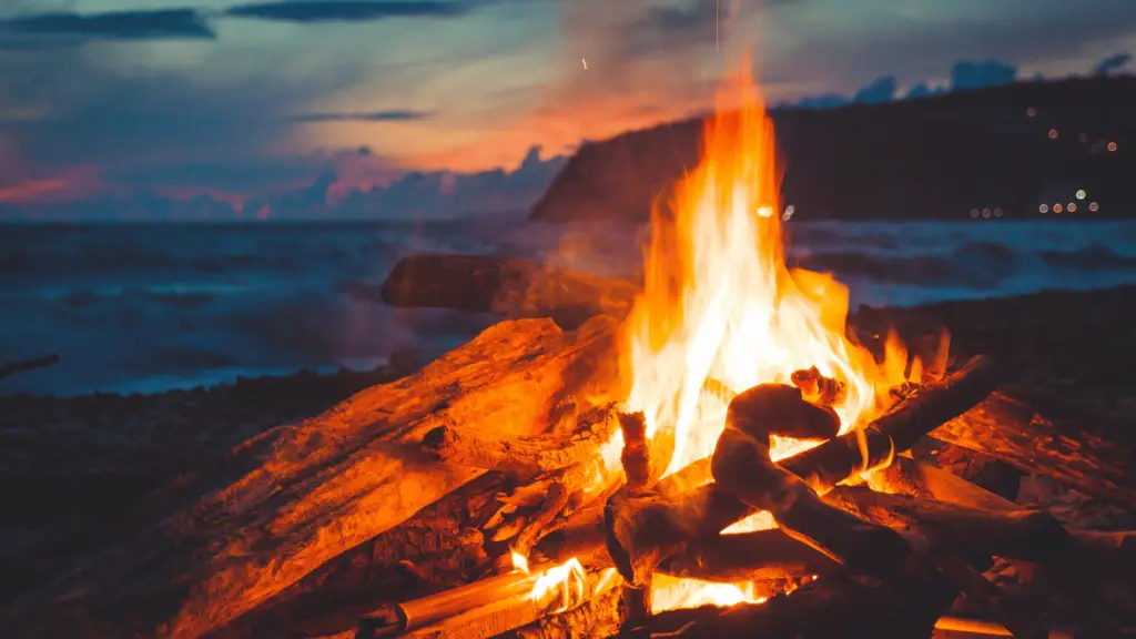 a beach bonfire at night