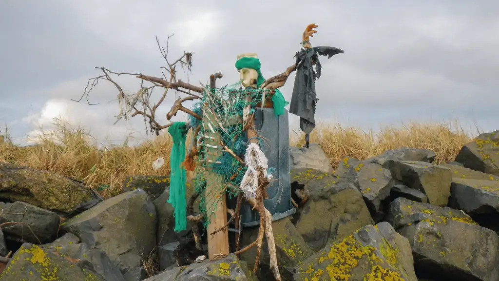 beach art scarecrow made of driftwood and garbage